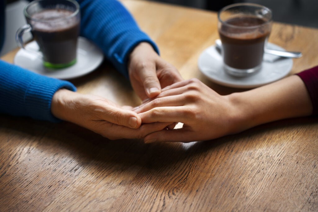 hands holding each other support